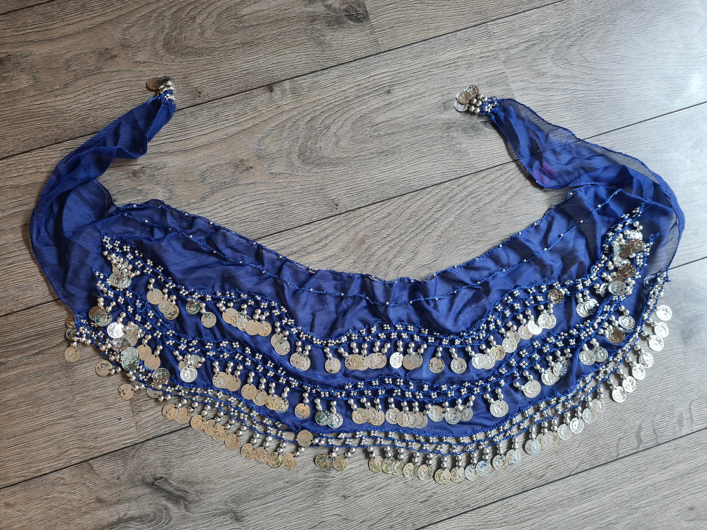 Blue hip scarf with silver coins