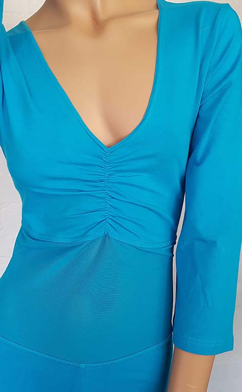 Catsuit turquoise with reinforced belly net. Only size left in XS / S / 3XL