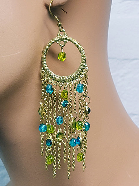 Gold-colored earrings with lime and turquoise accents