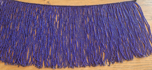 Beaded string with blue strands with many beads 16cm
