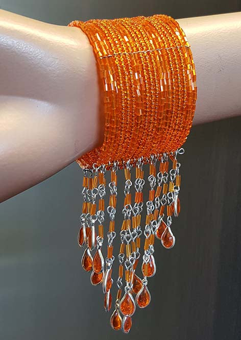 Bracelet in orange with beads
