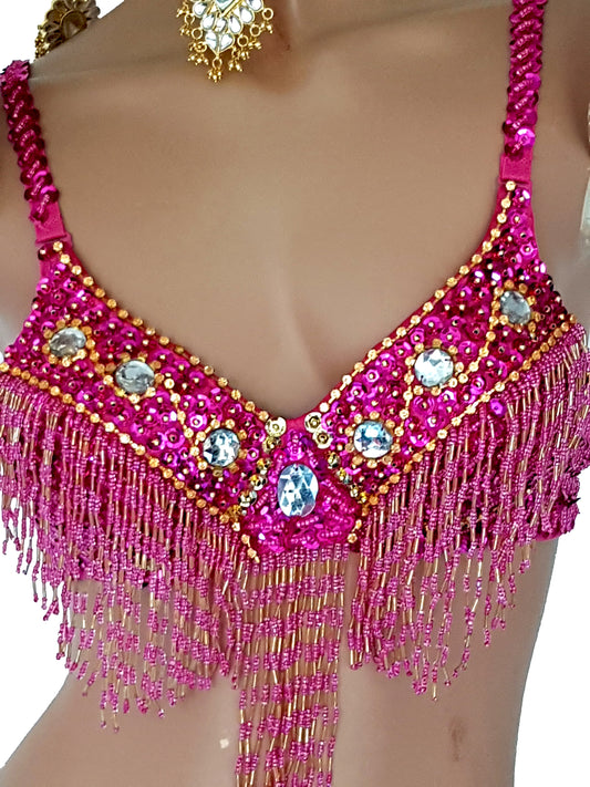 Fuchsia bra with gold sequins and silver rhinestones.
