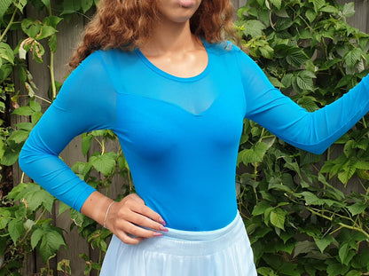 Comfortabele body met lange mouwen in turquoise. Maat M