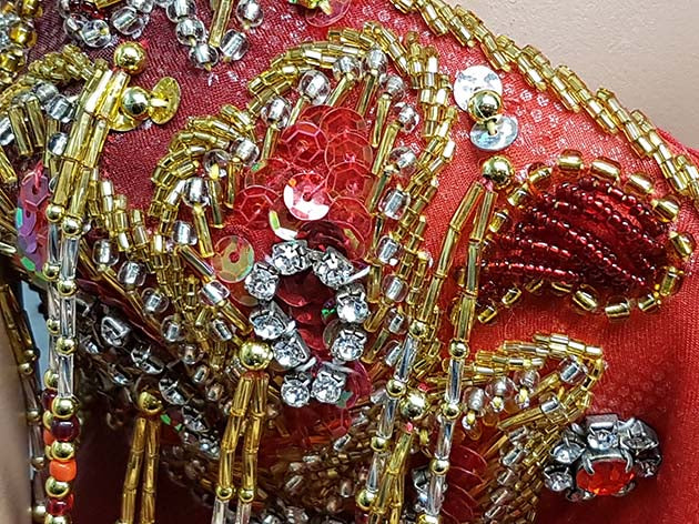 One-piece belly dance dress with bra.