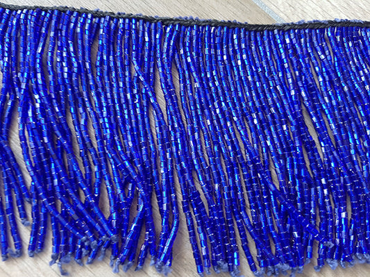 Beaded string with blue strands 30cm