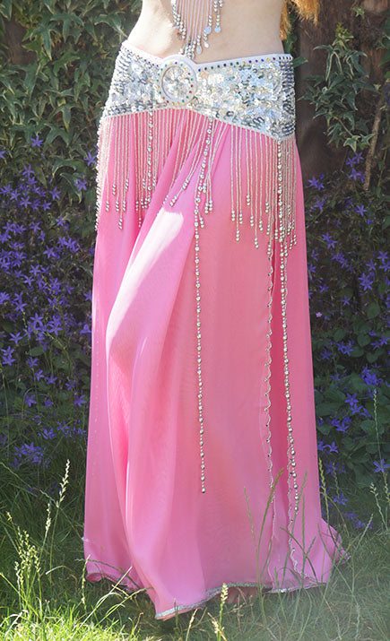 Belly dance skirt light pink with slit, finished with silver beads.