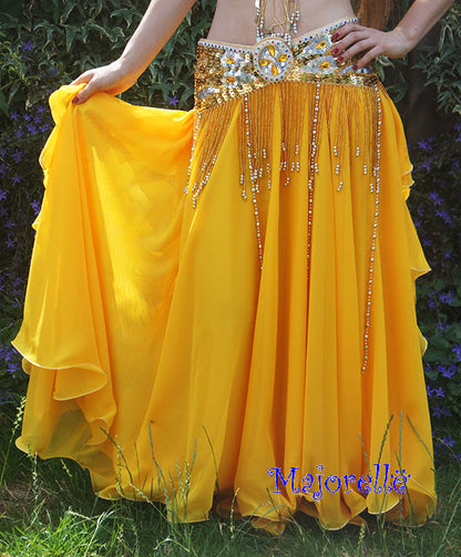 Nice skirt in golden yellow with ruffles and side slits