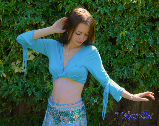 Cute tie top with butterfly sleeves in turquoise