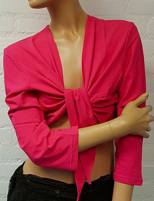 Belly dance top in fuchsia with three-quarter sleeves.