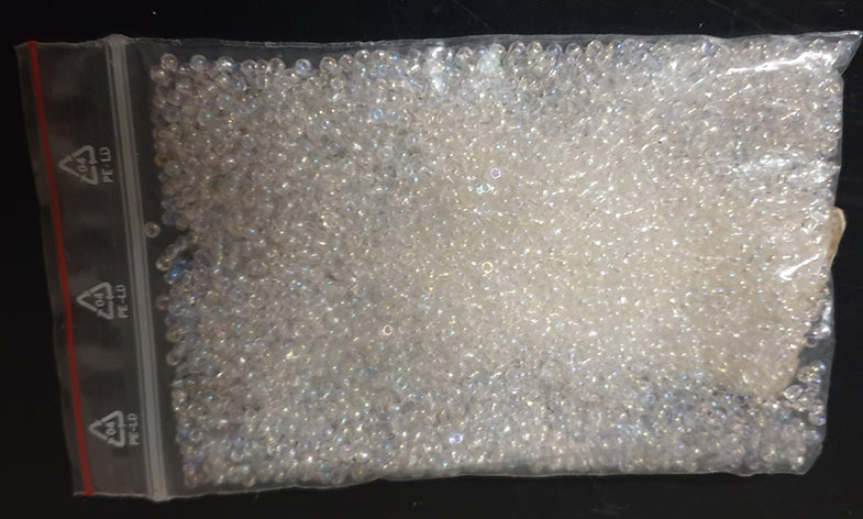 Glass beads white mother of pearl

 Bag 50 grams