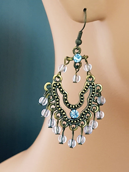 Gold-colored earrings with rhinestones 