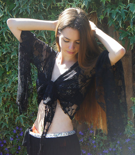 Black lace belly dance top made of stretch fabric with butterfly sleeves
