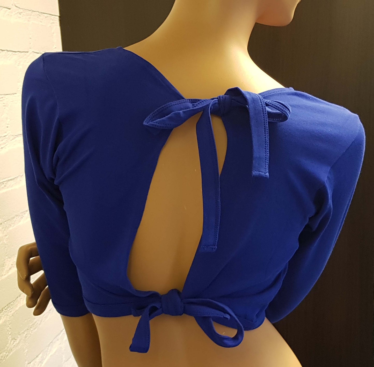 Top blue with open back L