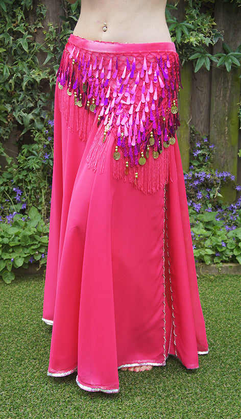 Belly dance skirt fuchsia with slit, finished with silver beads.