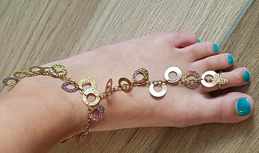 Foot jewelry with adjustable ring and ankle strap in gold
