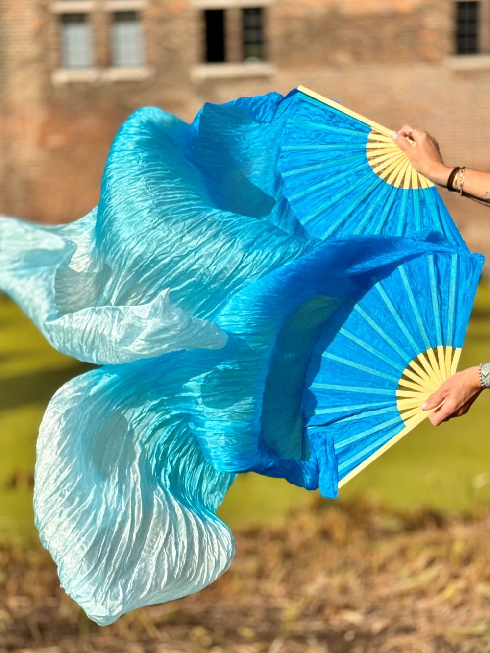 Silk veil fan in aqua with color gradient