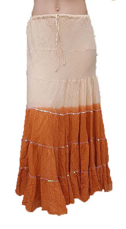 Katoenen rok (100%) met batikverloop in koper.