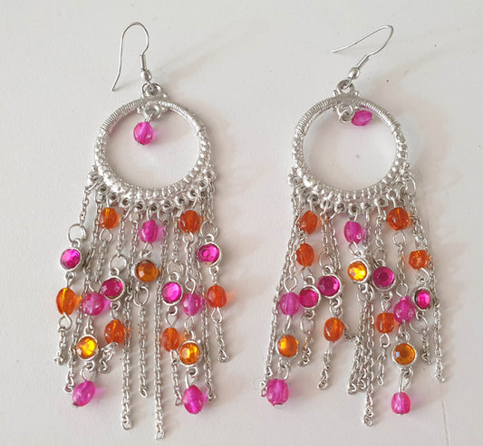Silver-colored earrings with fuchsia and orange stones


 Nickel free
